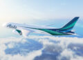 Image shows an Alaska Airlines plane with green and blue stripes on the fuselage flying in the sky with clouds below. Alaska Airlines Expands International Reach with New Routes to London and Reykjavik, MTB Events.