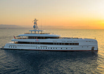 Image photographed by Alessandro Guerreri, shows a superyacht at sunset on sea. Hot Lab unveils striking refit of 50m Heesen superyacht Bijin.