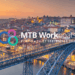 Image shows a cityscape image of Porto, Portugal with the Luis Bridge and the Douro River during sunset with the MTB Workboats logo overlaid in the centre. MTB Workboats heads to Porto with a focus on Collaboration and Opportunity, MTB Events.