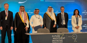 Image shows the contract signing event with six people standing behind a desk. RSGT and CMA CGM to Develop Next-Generation Terminal in Jeddah, MTB Events.