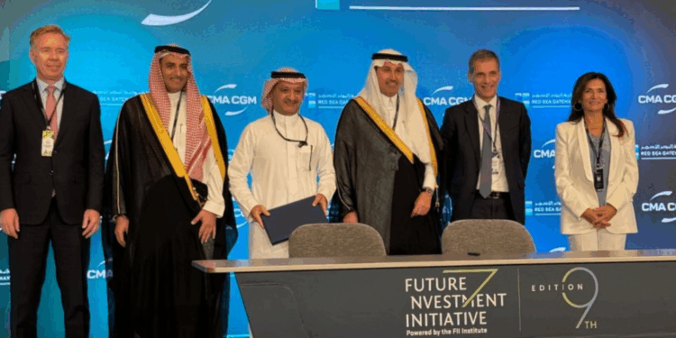 Image shows the contract signing event with six people standing behind a desk. RSGT and CMA CGM to Develop Next-Generation Terminal in Jeddah, MTB Events.