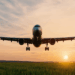 Image shows a plane flying at sunset above green grass. ASEAN Set to Become a Key Player in Global SAF Supply by 2050, MTB Events.