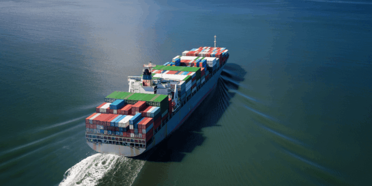 Image shows a container ship at sea. Eutelsat and Can Marine Join Forces to Enhance Maritime Connectivity with OneWeb LEO, MTB Events.