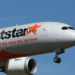 Image shows the front half of an airplane with the Jetstar livery, in the sky. Jetstar Japan Ownership Change Signals Shift in Japan’s LCC Market, MTB Events.