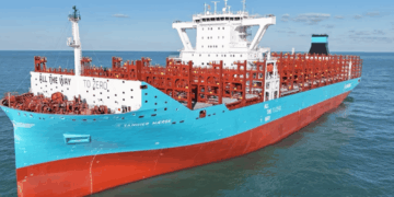 Image shows a medium sized vessel sailing on the ocean, the bottom of the ship is red while the top half is blue. Maersk Expands Mid-Size Fleet with First Dual-Fuel Vessel, MTB Events.