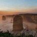 Image shows the twelve apostles in Melbourne at sunset. British Airways Boosts Winter Schedule with New Routes and More Flights, MTB Events.