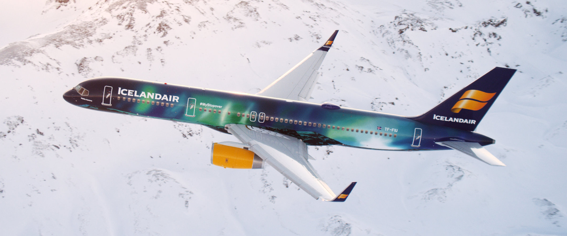 7 of the most unusual and impressive aircraft liveries, MTB Events. Image shows an Icelandair aircraft with blue and green colours painted like the northern lights along the fuselage.